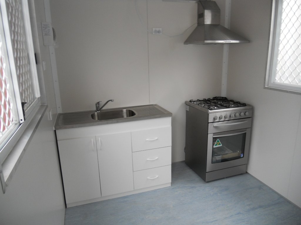 Kitchenette and stove with extractor fan