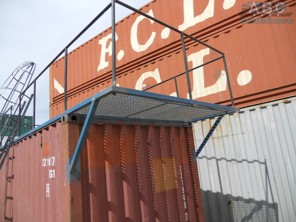 shipping container with mesh overhang