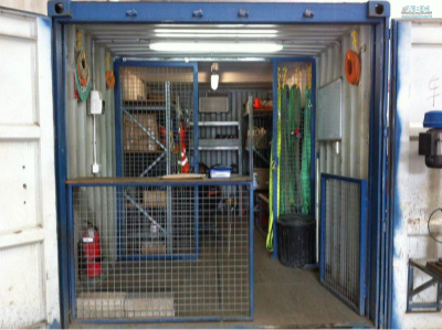 Small Shipping Container with Equipment Racks